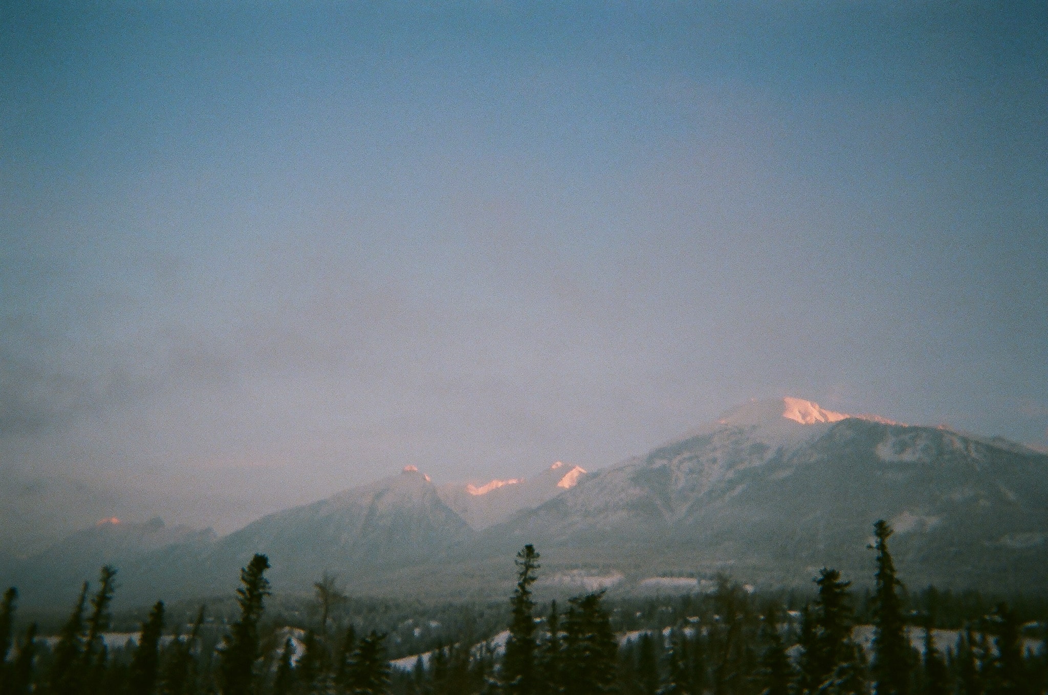 landscape photo of snowy mountains in banff